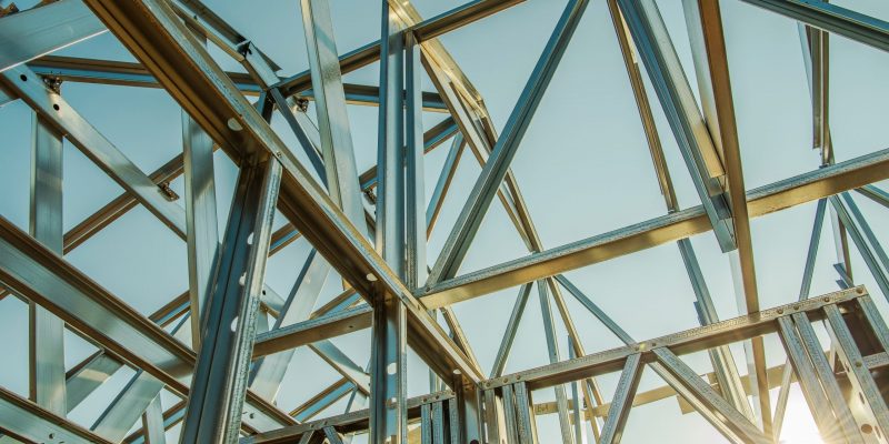 Building Steel Skeleton Frame at Sunset. Modern Building Structure Technologies.